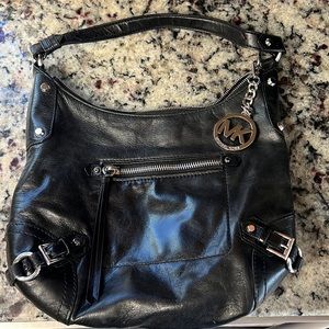 Michael Kors black leather w, chrome hardware